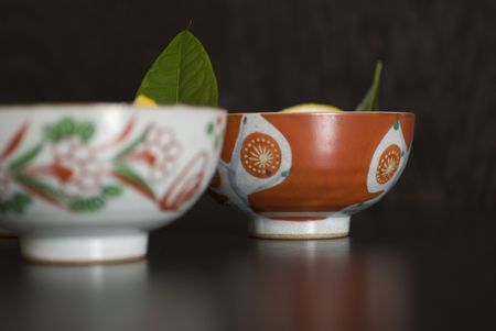 Asian herb tea on an old rustic cupの写真素材