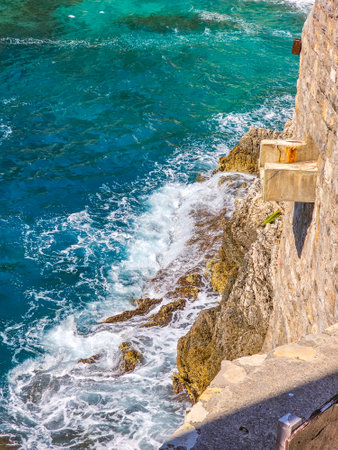 View of the sea from the cliff, Cefalu, Sicily, Italyの写真素材