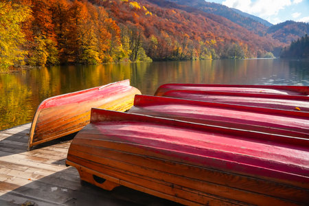 Wooden Boats on Pier at Belgrade Lake in Autumnの写真素材