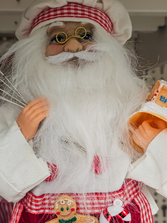 Santa Claus Figurine Dressed as a Baker Holding a Whisk