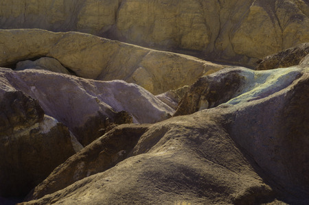 Mineral deposits on the mountain create a palette of colorの写真素材
