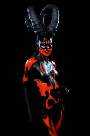 Beautiful demon woman with hornsの写真素材