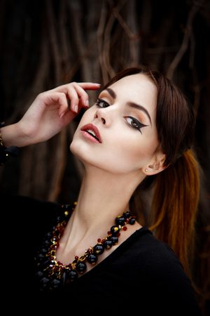 Sensual pretty brunette female fashion model faceの写真素材