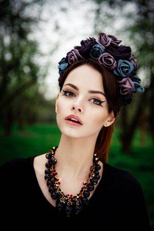 Sensual pretty woman face wearing floral wreathの写真素材