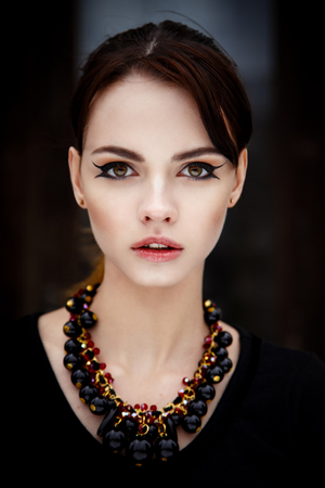 Sensual pretty brunette female fashion model faceの写真素材