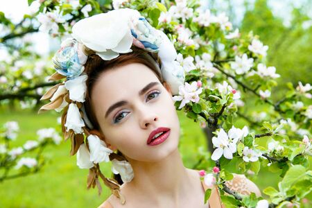 Sensual sexy woman face wearing floral wreathの写真素材