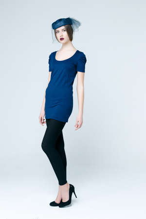 Pretty brunette woman with blue hat and mesh,の写真素材