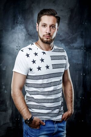 Elegant young handsome man. Studio fashion portrait.の写真素材