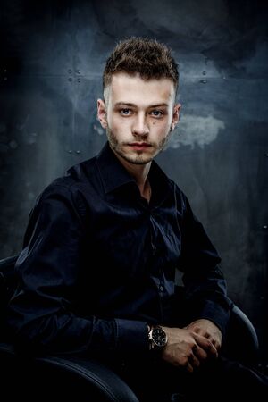 Elegant young handsome man. Studio fashion portrait.の写真素材