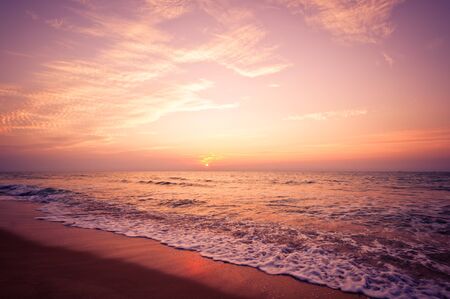 Beach in Cha-am, Thailand. Shooted in the morning with amazing sunrise sky.の写真素材