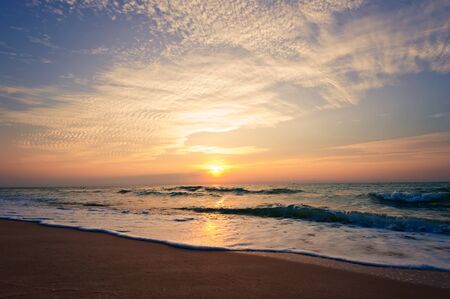 Beach in Cha-am, Thailand. Shooted in the morning with amazing sunrise sky.の写真素材