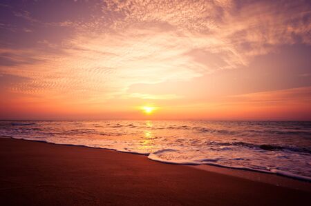 Beach in Cha-am, Thailand. Shooted in the morning with amazing sunrise sky.の写真素材