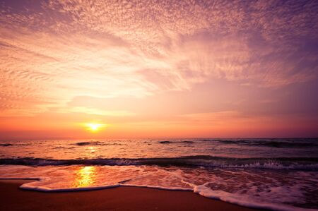 Beach in Cha-am, Thailand. Shooted in the morning with amazing sunrise sky.の写真素材