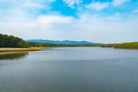 Blue sky reflected on Lake Jusan, Aomori, Japanの写真素材