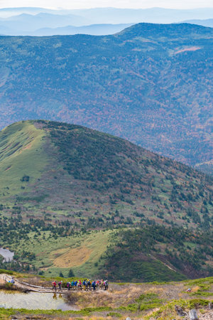 Autumn in Hakkoda, Sennintai and people taking a break on the trail, Aomori, Japanの写真素材