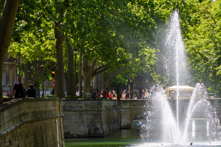 Fountain on rue Fontaine, Nimes, Franceの写真素材