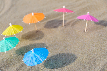 Colorful umbrellas on the beach. Summer vacation concept.の写真素材
