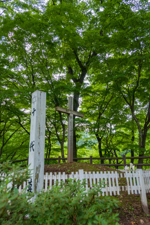 A view of a cross and Star of David in a park. Shingo Village, Aomori, Japan