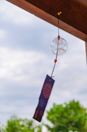 Wind chimes swaying in the windの写真素材