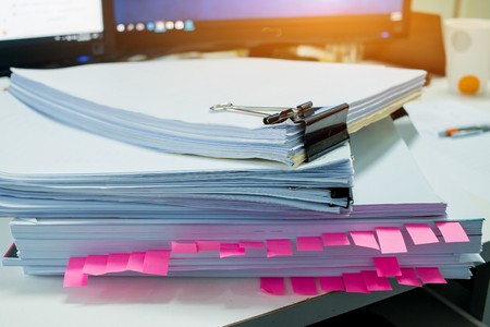 Stacks of documents files for finance of office working.Business report papers or Piles of...