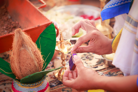 newlywed hands with mehendi and braceletsの写真素材