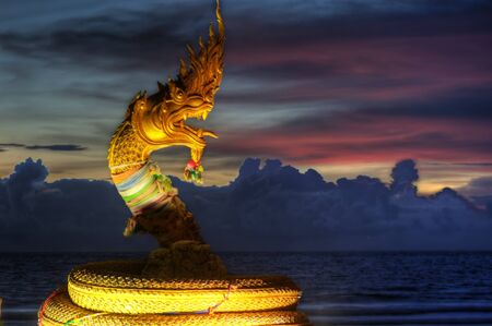 golden dragon shooted just after sunset in Thailandの写真素材