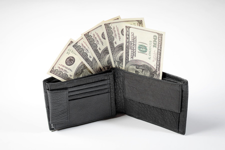 dollar bills in a black mens wallet on a white background and a passport of the Russian Federation