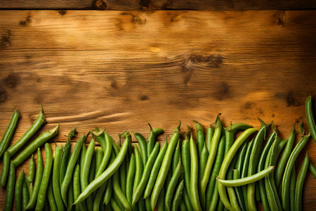 green beans composition flat lay with free space for copy yellow wood backgroundの素材