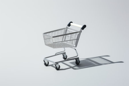 White isolated shopping cart with shadowの素材