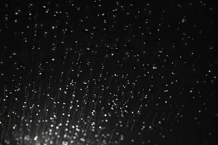 Slow motion black background raindrop animation black and white matte ideal for film digital composiの素材