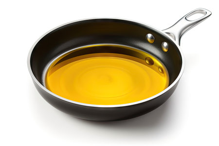 Cooking oil isolated on white with fry panの素材