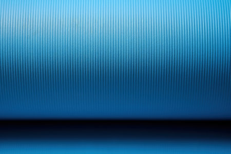 Blue yoga mat texture background top view copy space promoting healthy lifestyle sport and exerciseの素材