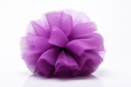 Purple shower sponge on white backgroundの素材