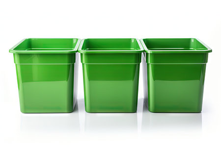 Three new green large bins isolated on whiteの素材