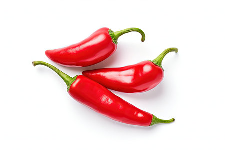 Top view of red peppers on white backgroundの素材