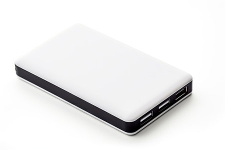 External power bank for charging devices isolated on white backgroundの素材