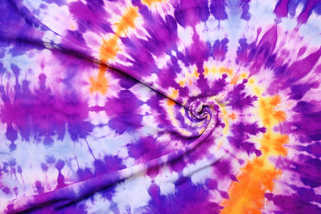 Bohemian tie dye fabric with swirls of violet and sky blue featuring a nautical psychedelic paint deの素材