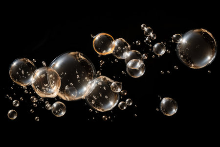 Bubbles isolated with black backdropの素材