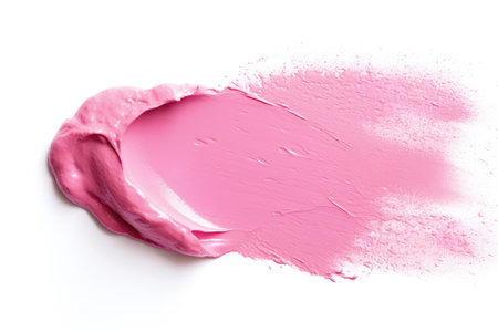 Pink lipstick smudge on white background viewed from aboveの素材