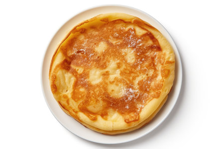 Close up top view of a homemade Russian pancake on a white backgroundの素材