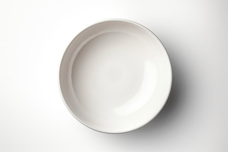 White ceramic bowl isolated on white background with shadow traditional kitchenware conceptの素材