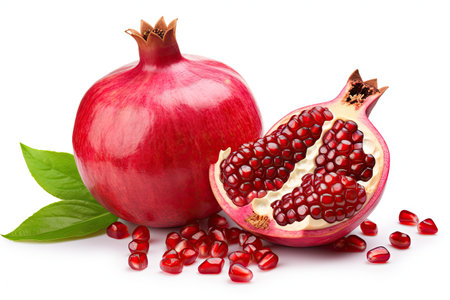 Fresh raw pomegranate piece isolated on white background with full depth of fieldの素材