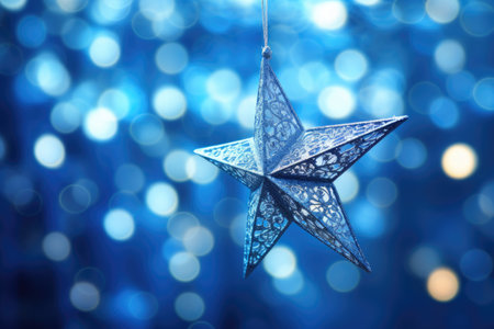 Abstract blue night with defocused shiny Christmas star lights.の素材