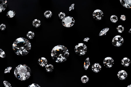 Top view of various cut diamonds on black background with blank spaceの素材