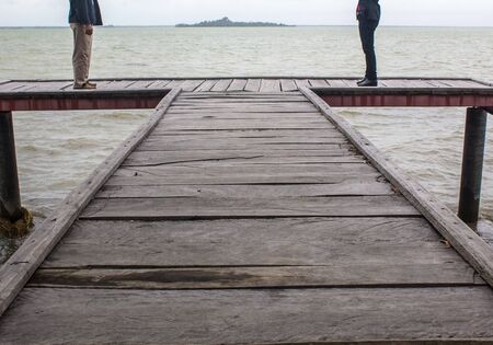 you and me on the wood bridge の写真素材