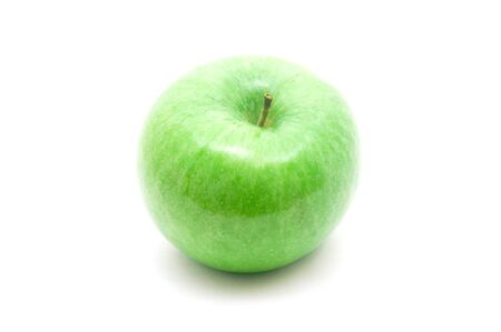 Green apple isolated on white backgroundの写真素材