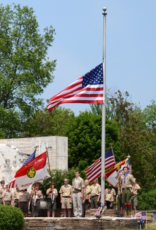 ANN ARBOR, MI - MAY 27: Boy scouts after placing the flag at half mast at the annual Memorial Day observance on May 27, 2012 at Arborcrest Memorial Park in Ann Arbor, MIのeditorial素材