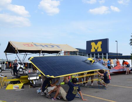 ANN ARBOR, MI - JULY 16: University of Michigan solar car team at the American Solar Challenge stop...