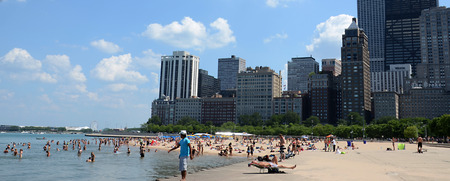 CHICAGO - JULY 19: Beachgoers enjoying a sunny day at Ohio Beach in Chicago, IL, July 19, 2013のeditorial素材