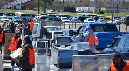 ANN ARBOR, MI - APRIL 26: Workers stack electronic equipment at an electronic recycling event in Ann Arbor, MI April 26, 2014.のeditorial素材